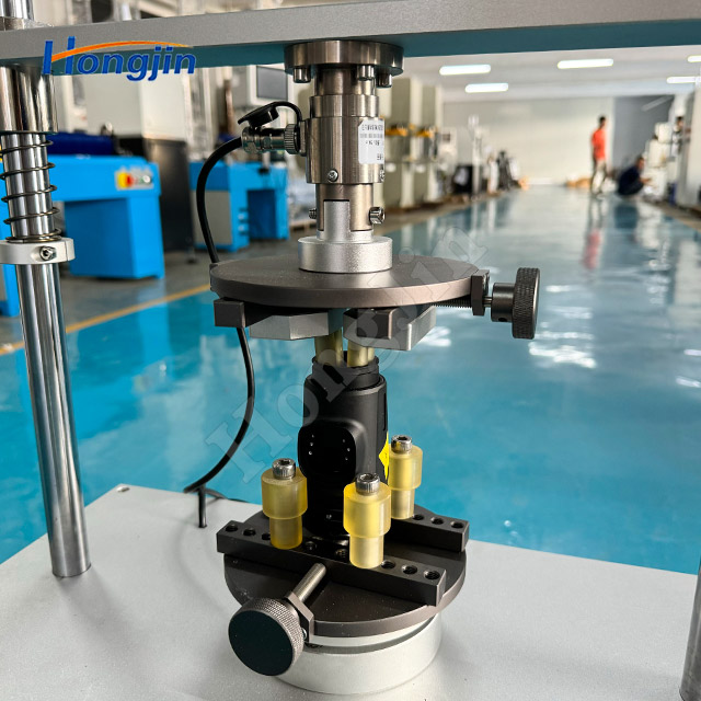 Máy kiểm tra lực xoắn ống kính